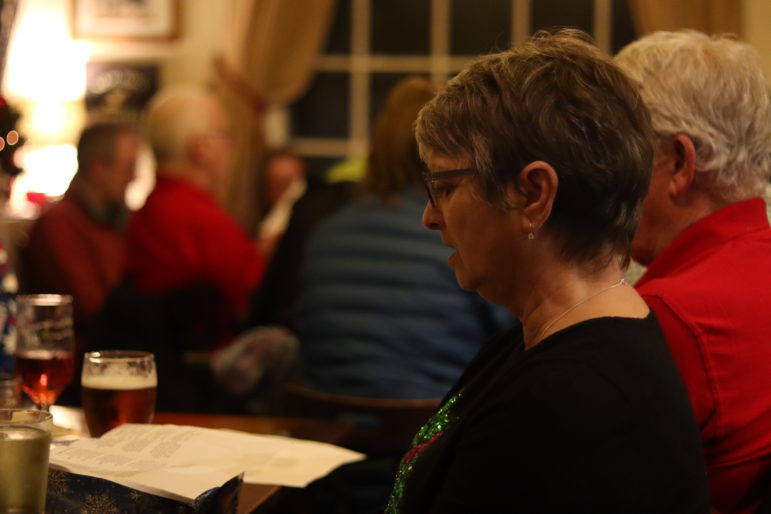 a woman in a pub