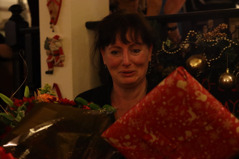 a woman with a present