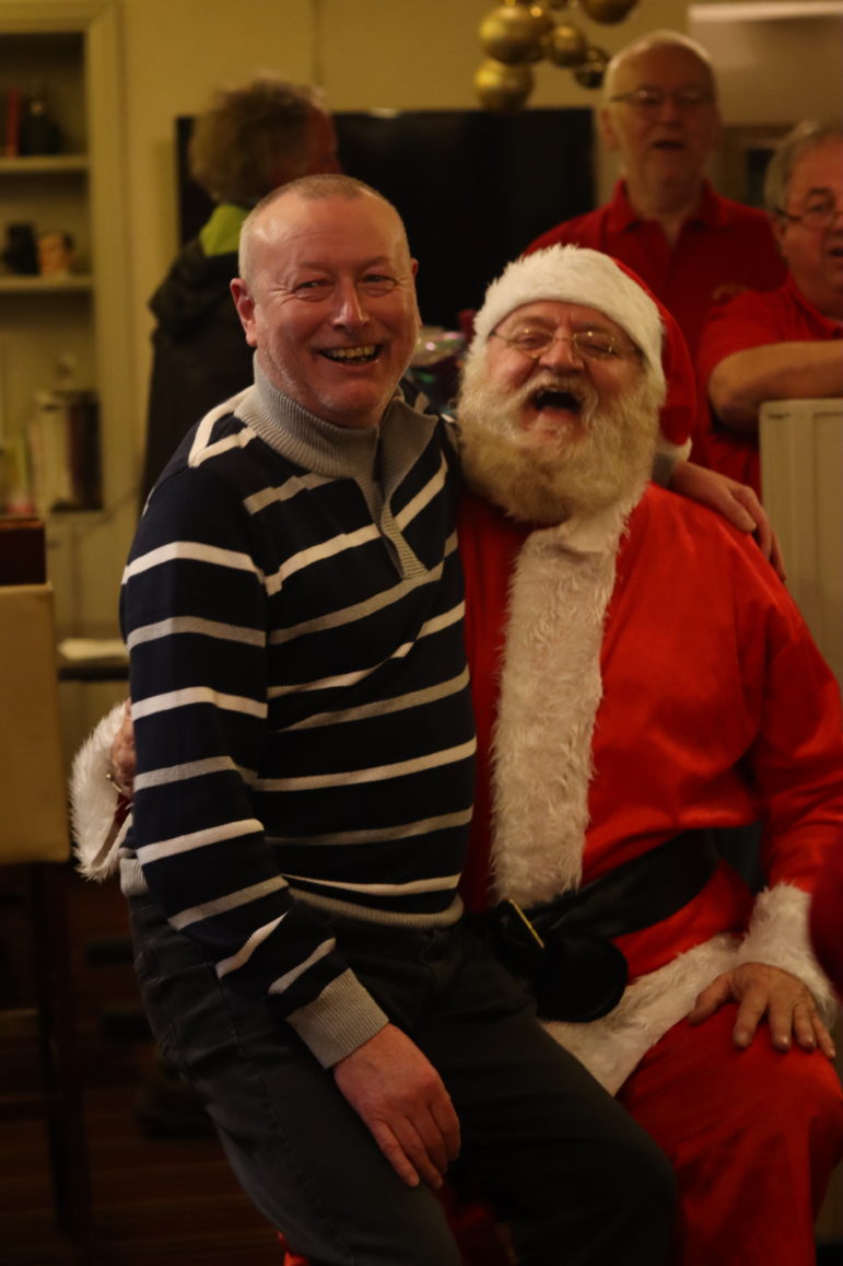 a man on santa's lap