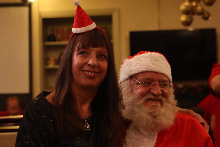 a woman with santa