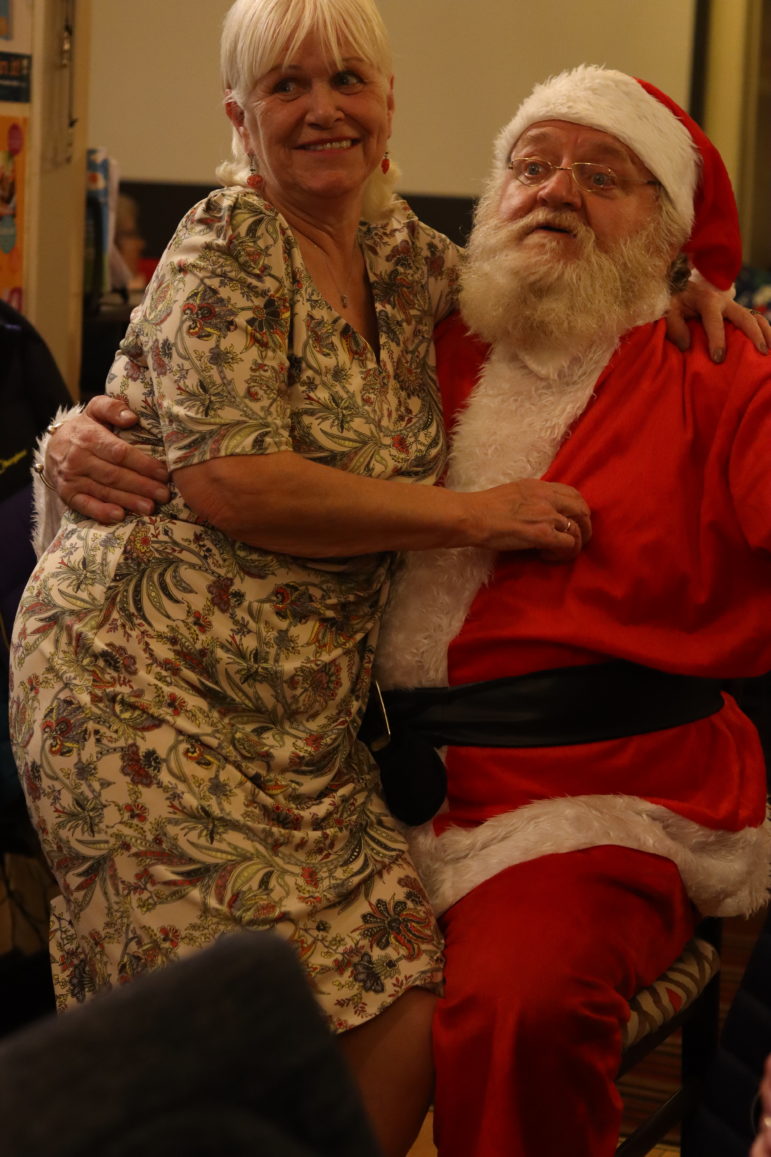 a woman on santa's lap