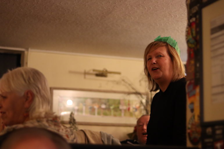 a woman in a christmas hat