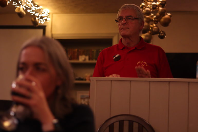 a man in a red polo shirt