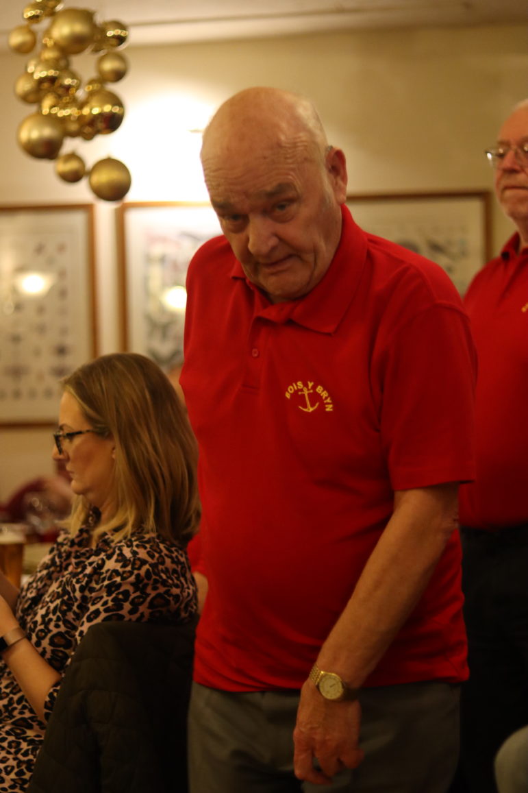 man in red polo shirt