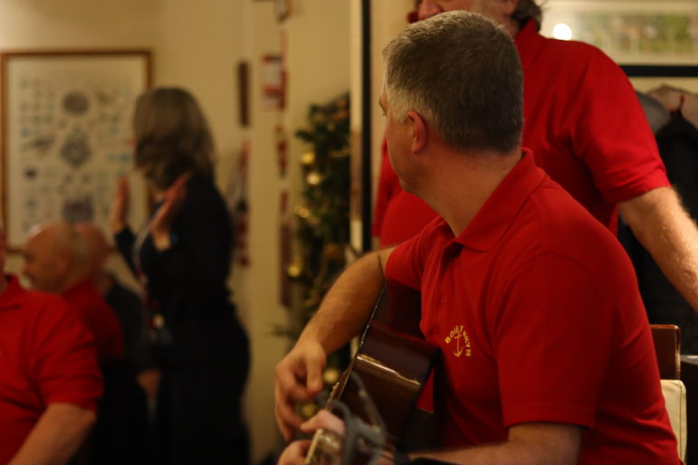 man playing guitar