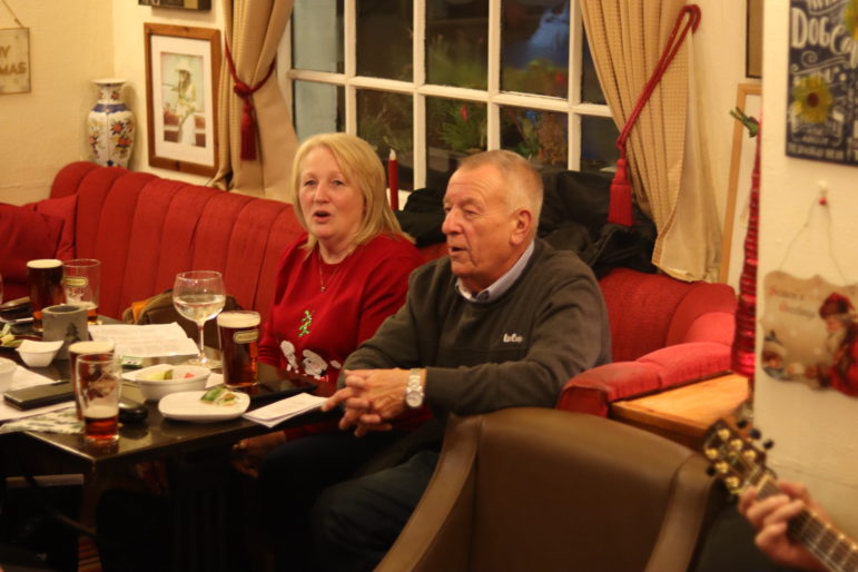 man and woman at pub table