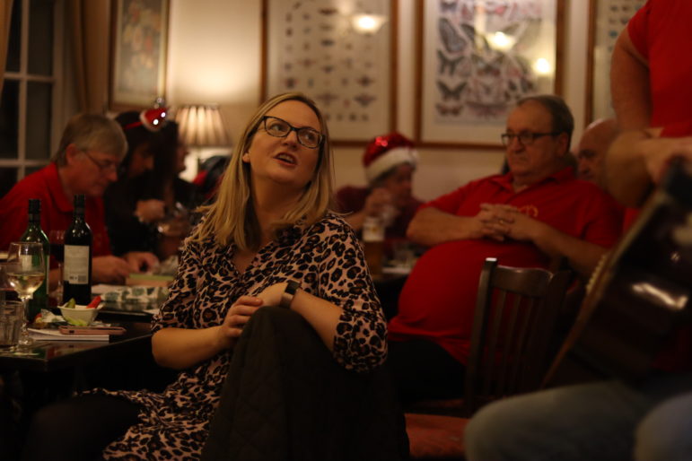 a woman in a pub