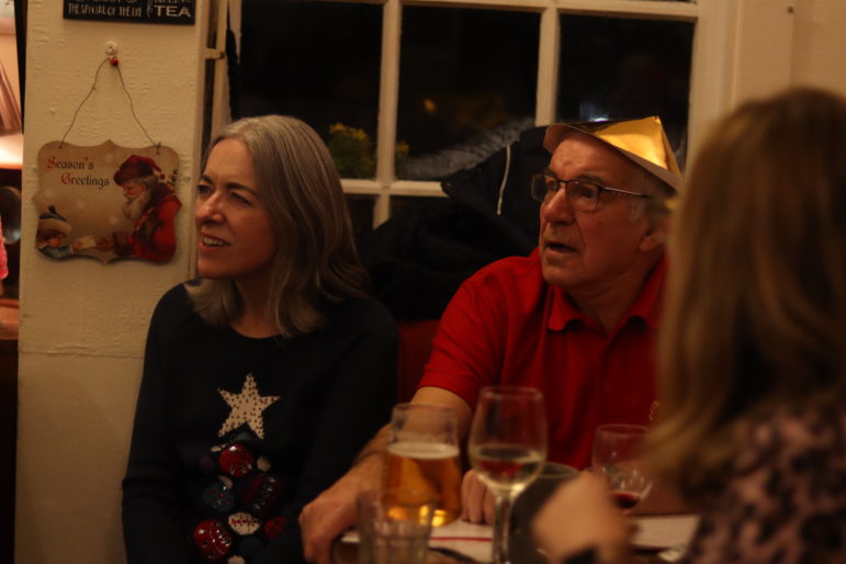 a man and a woman at pub table