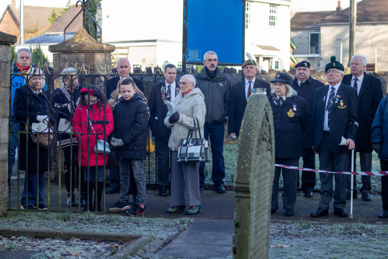Group of people at a graveside service