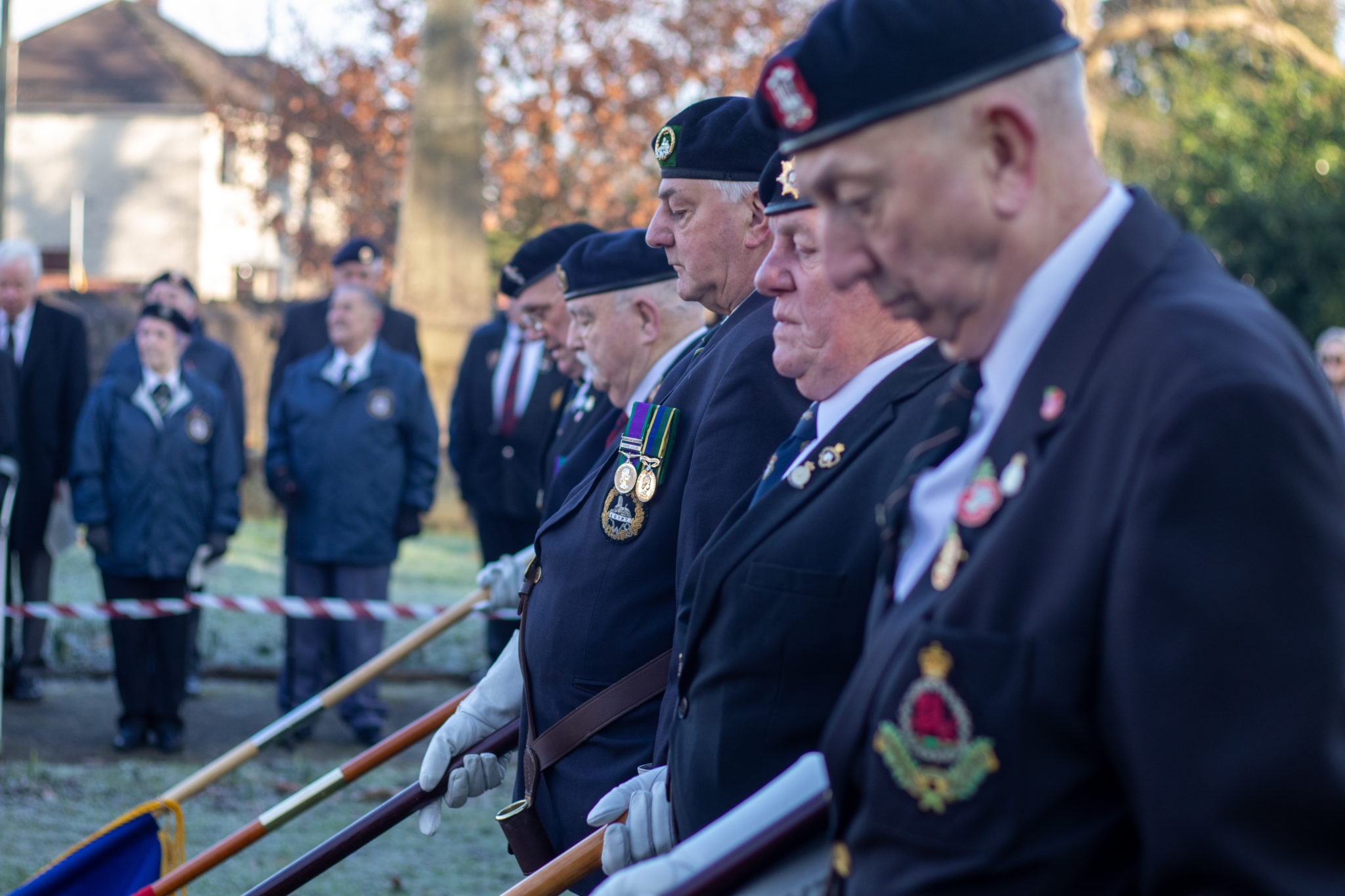 A group of flag standard bearers