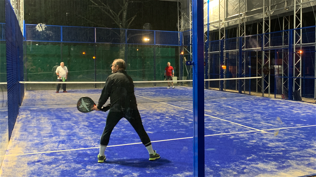 Players on a padel tennis court