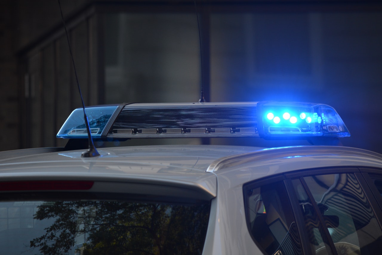 blue flashing lights on police car