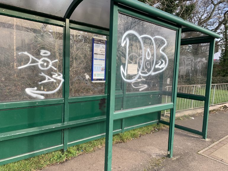 A vandalised bus stop