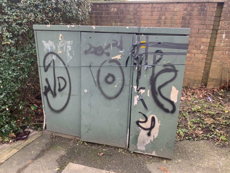 Graffiti on a phone exchange box