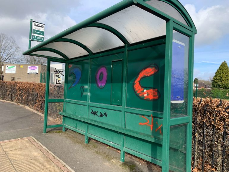 A vandalised bus stop