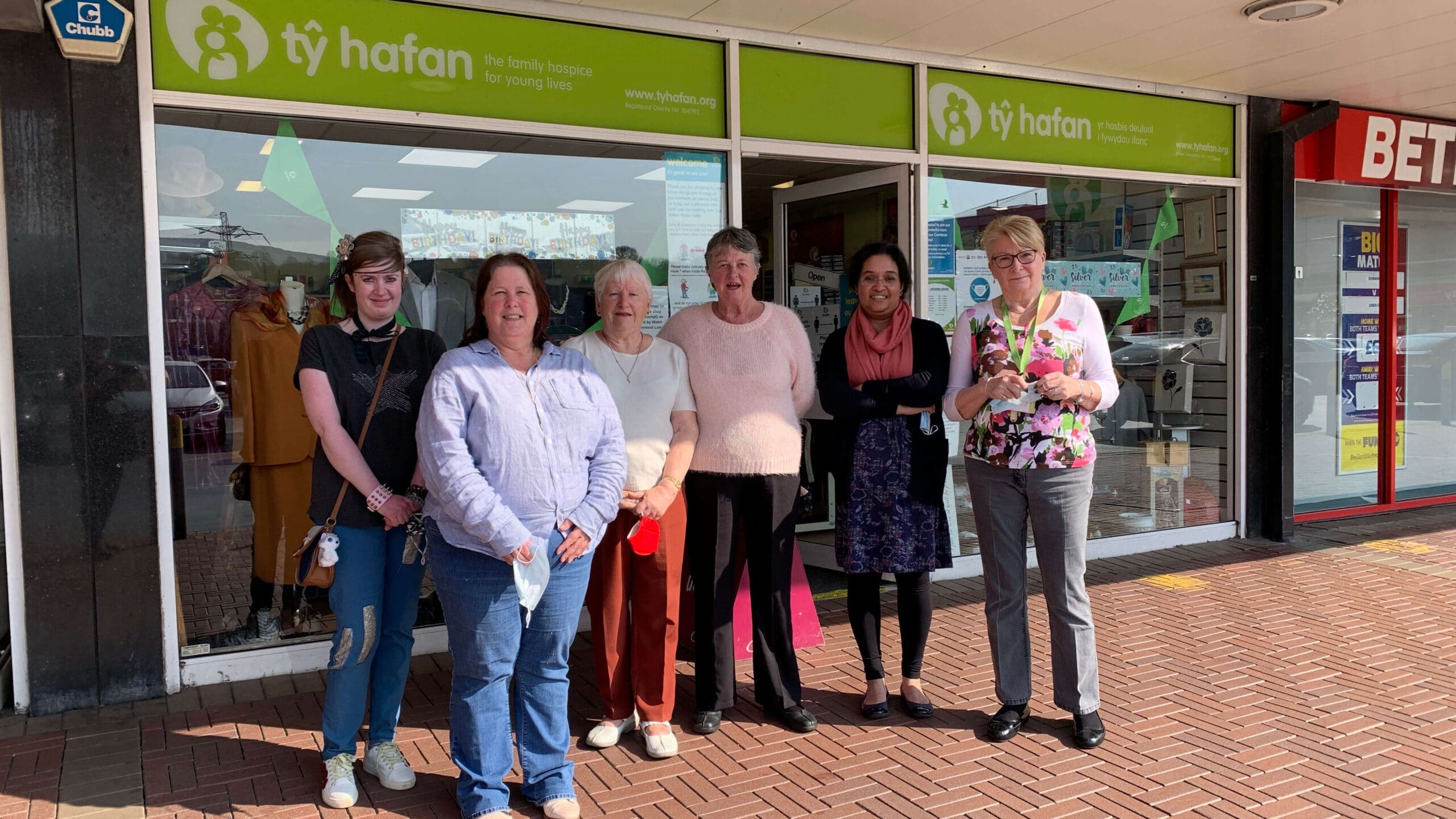 Staff and volunteers stood out the Ty-Hafan shop in Cwmbran