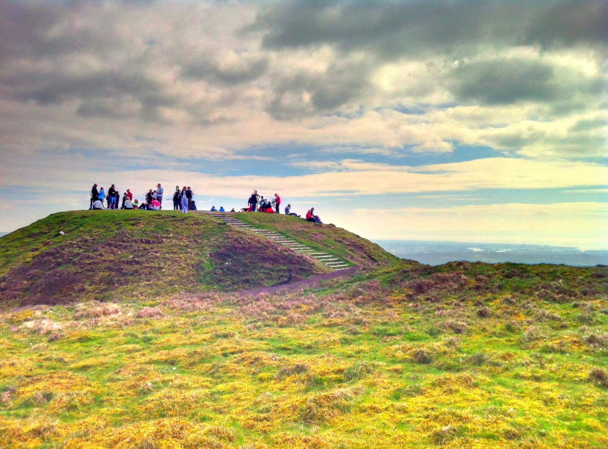 A group of people on top of a hill