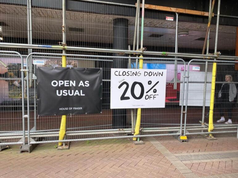 a shop's closing down sale sign