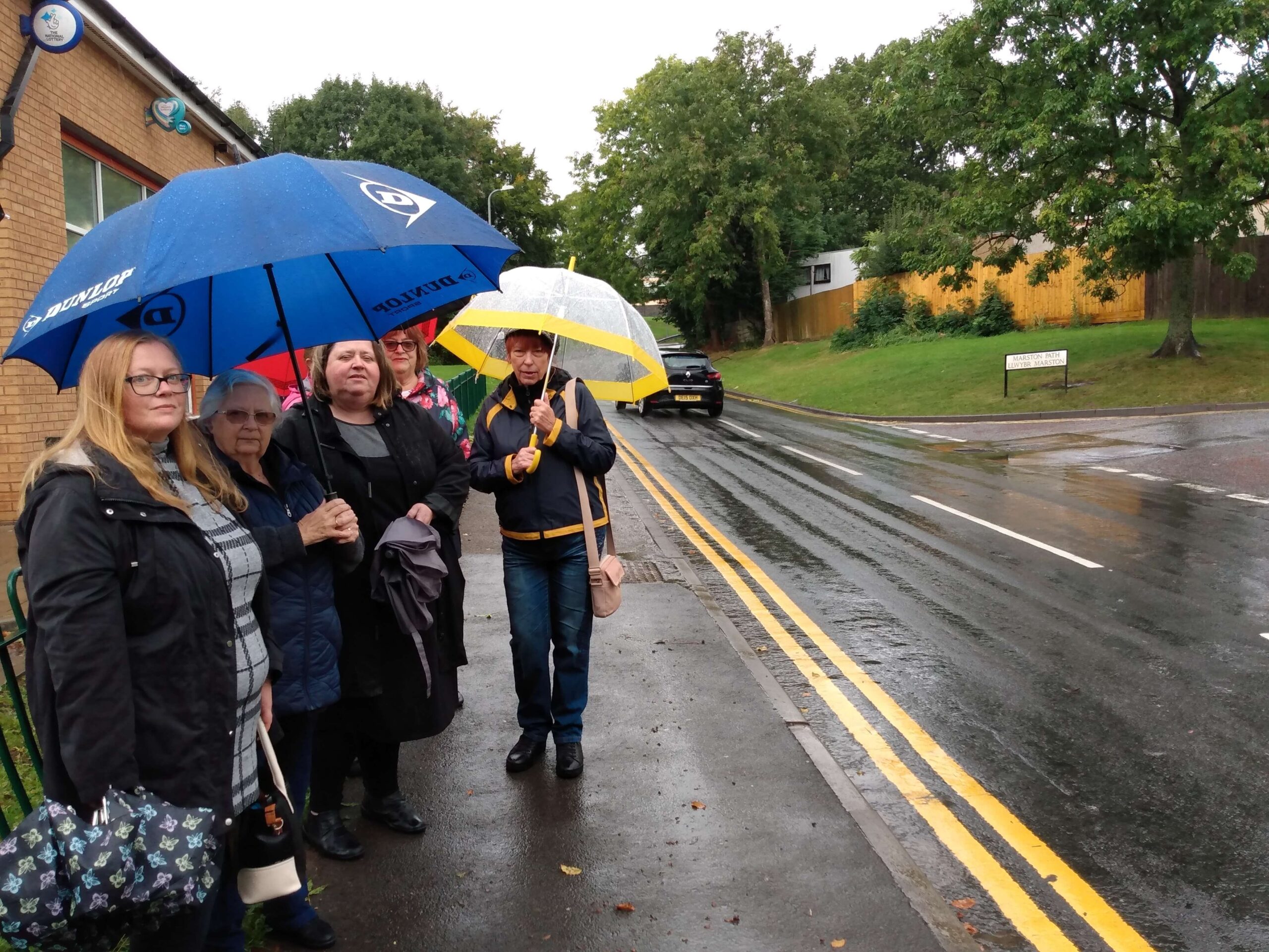 group of people stood at roadside