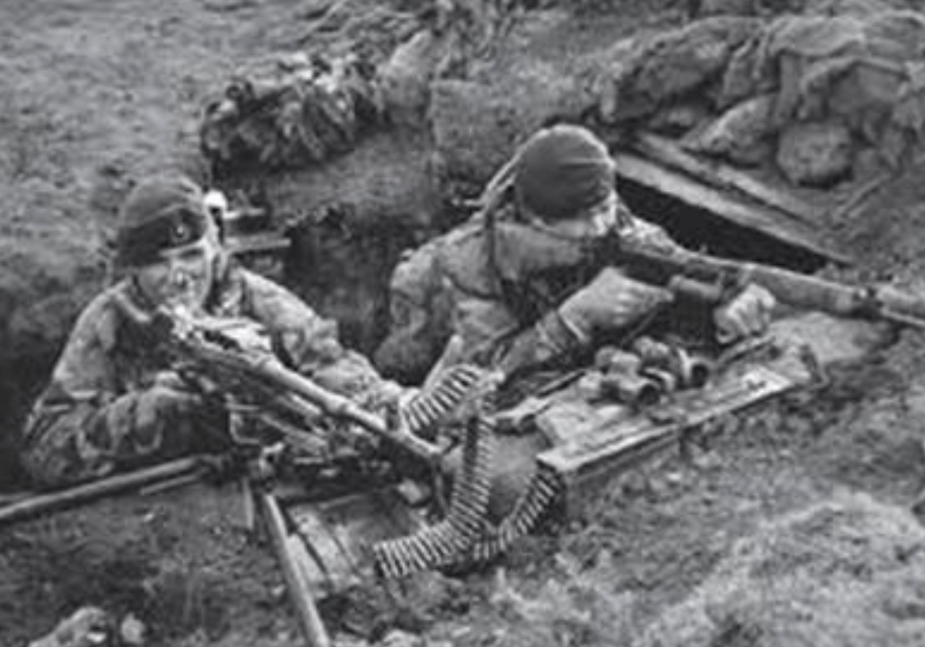 two soldier holding rifles in a dugout
