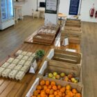 baskets of oranges and apples