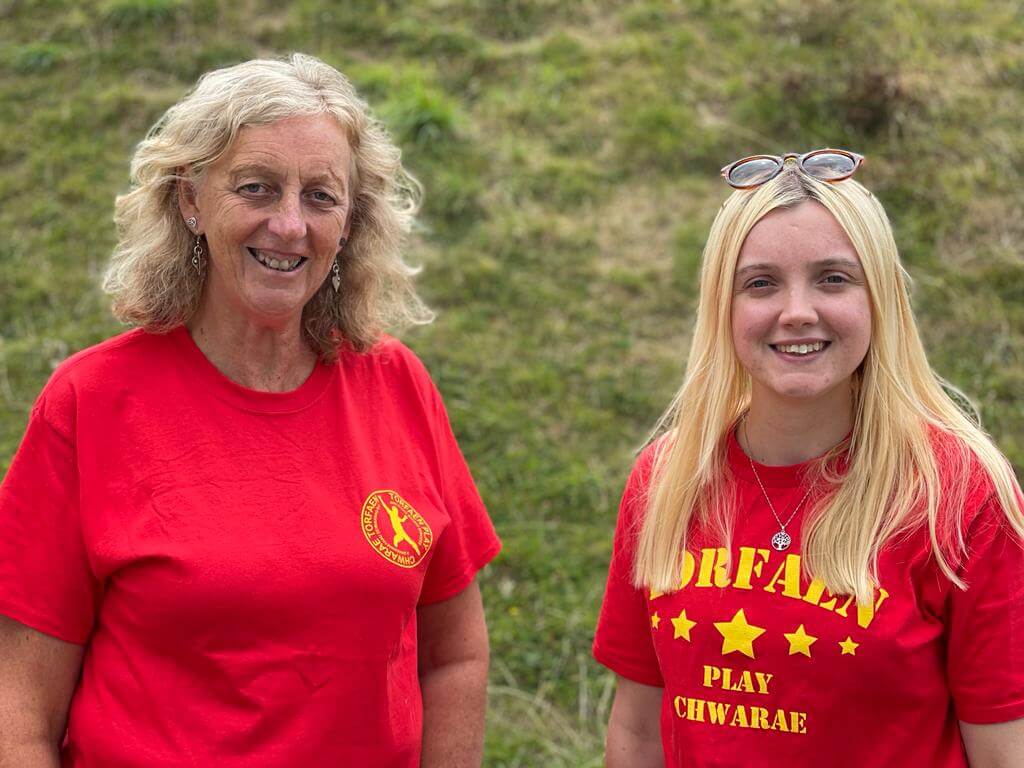two women in red t-shirts