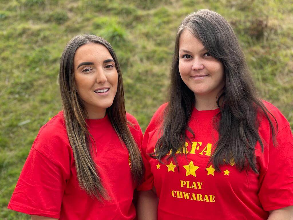 two women in red t-shirts