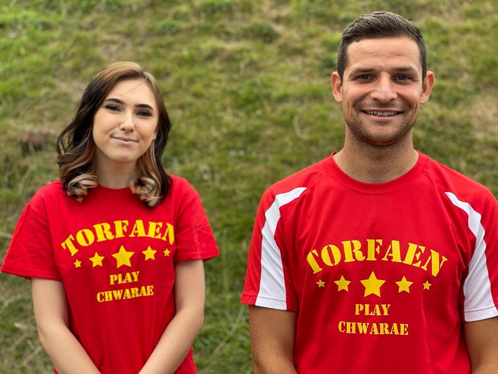 woman and man in red t-shirt