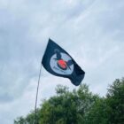 a flag with black crow on it