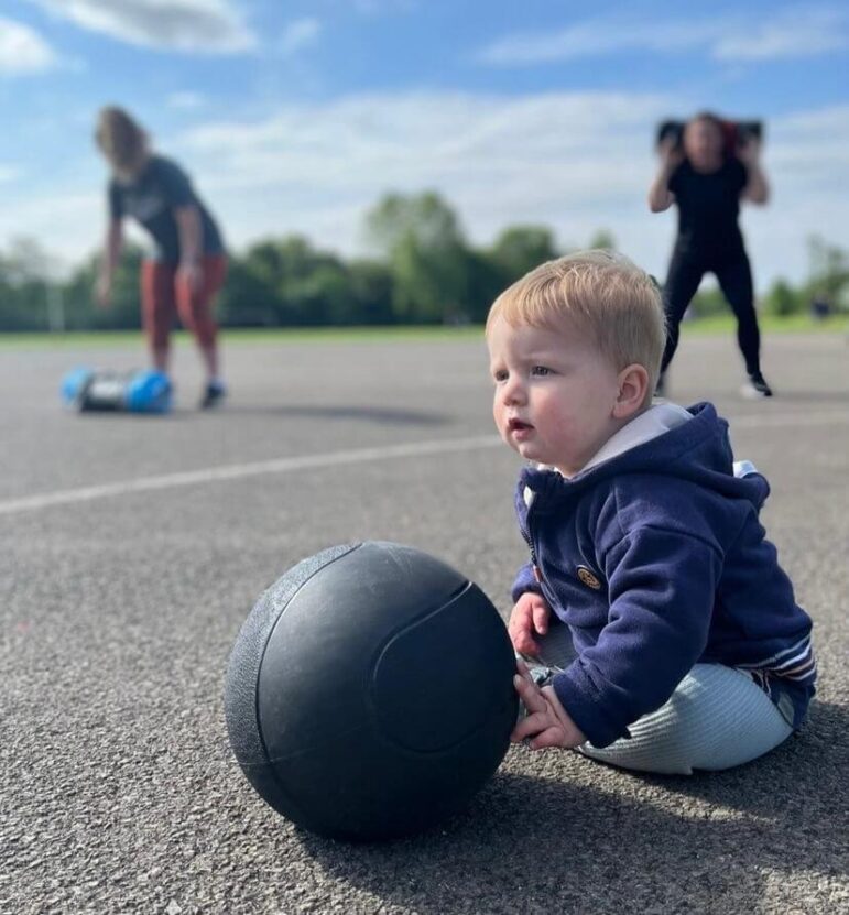 a baby with a football