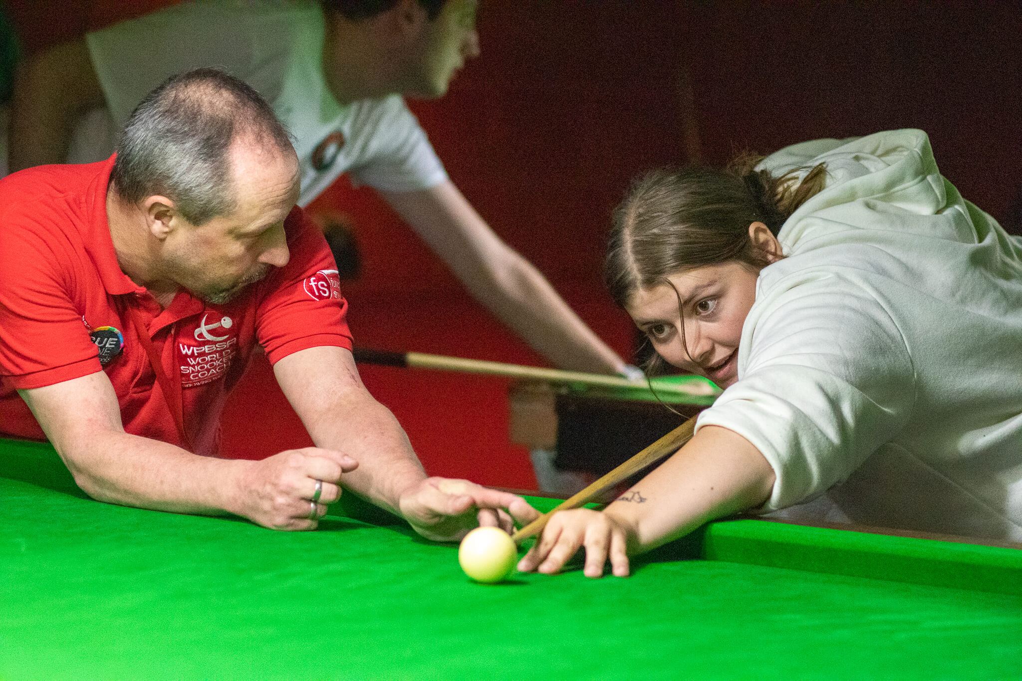 woman playing snooker