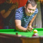 man playing snooker