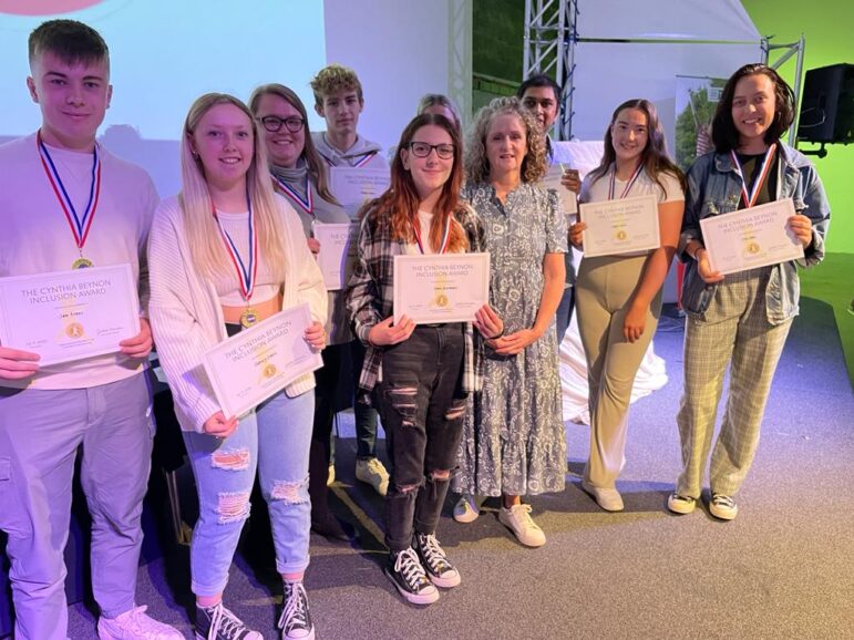 group of people with certificates