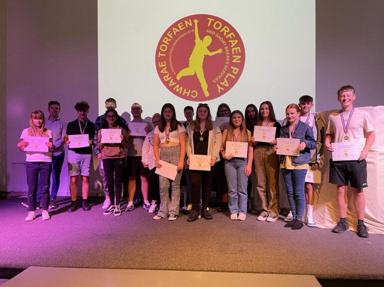 group of people with certificates