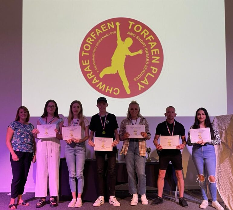 group of people with certificates