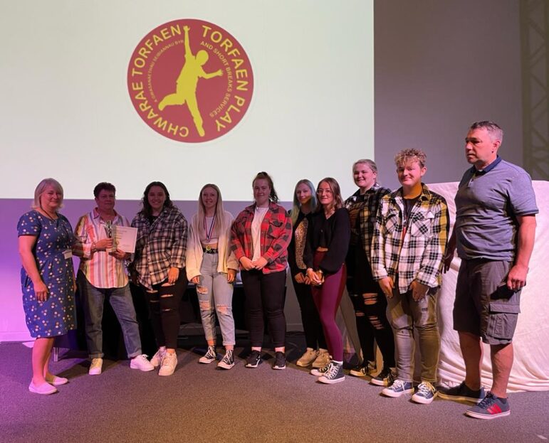 group of people with certificates