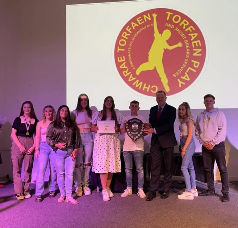group of people and certificates
