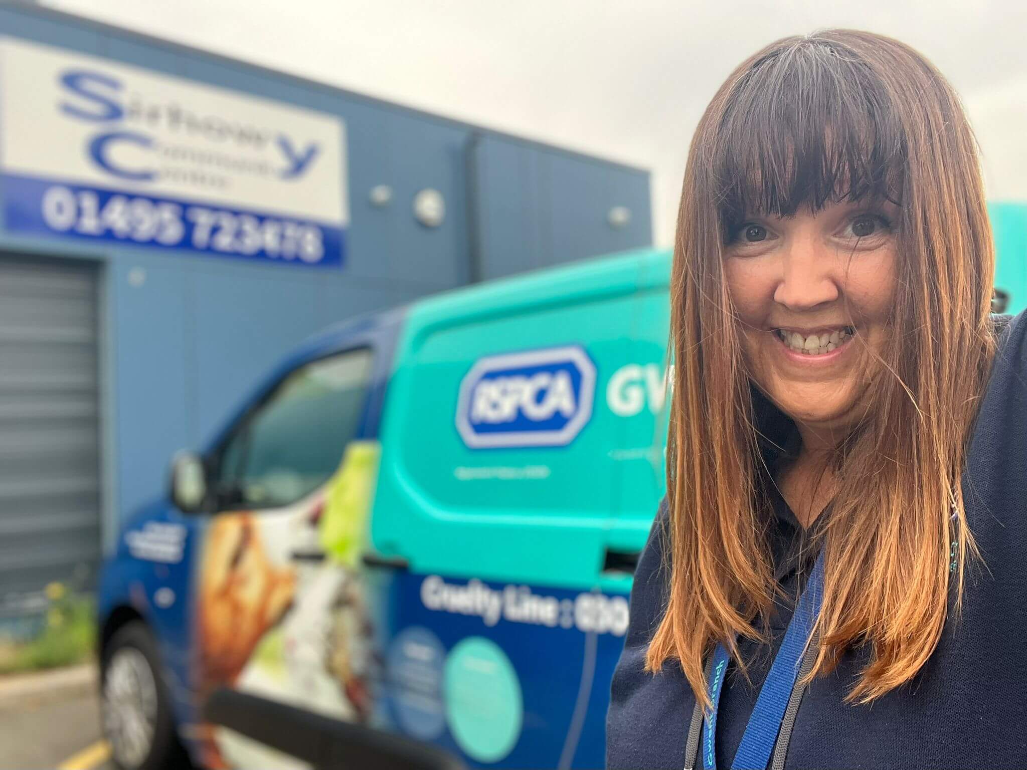 woman outside RSPCA van