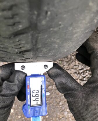 a tyre tread being measured