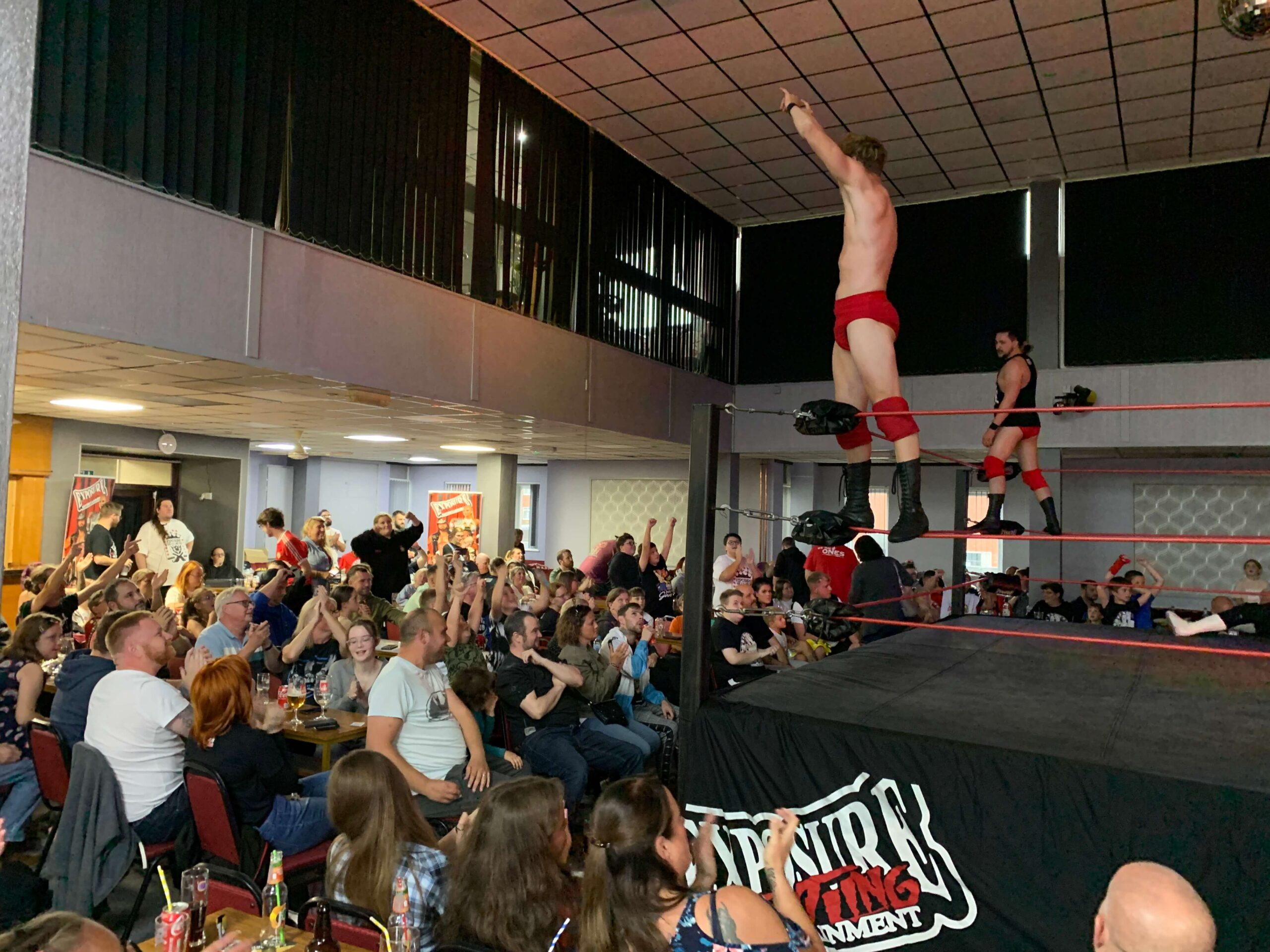 a wrester on the corner post