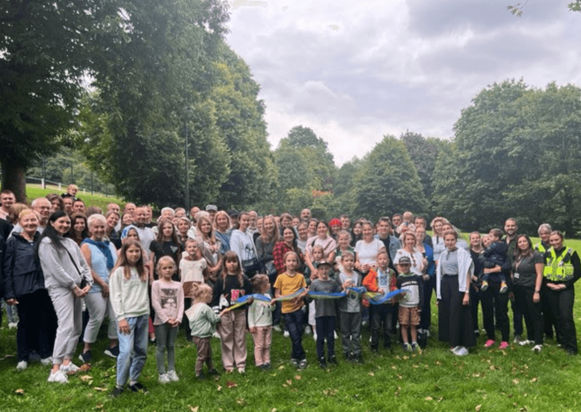 large group of people in park