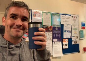 man with cup of coffee