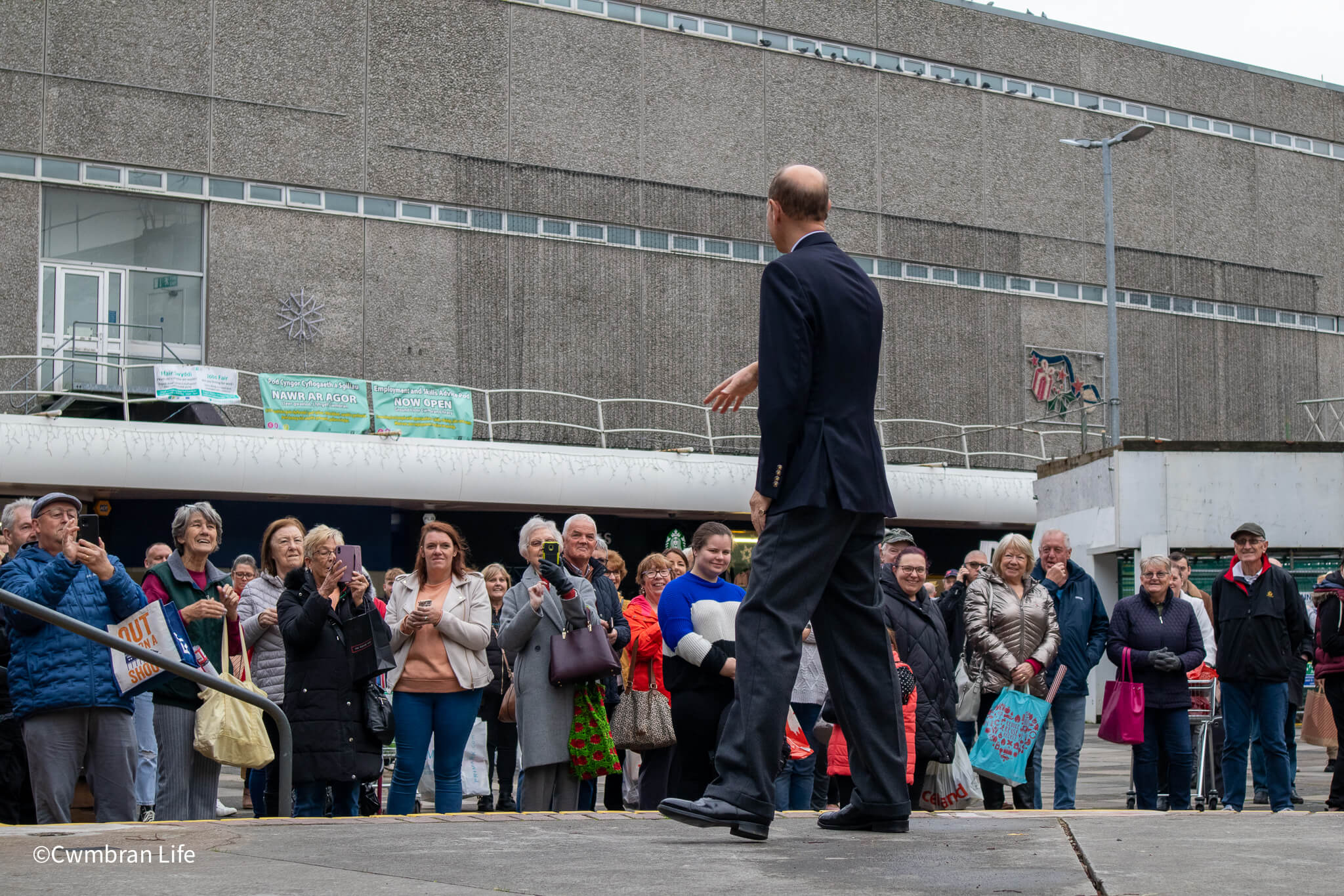 prince edward talking to shoppers