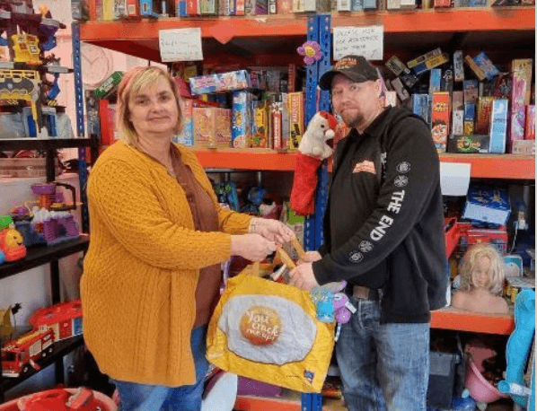 two people in a shop