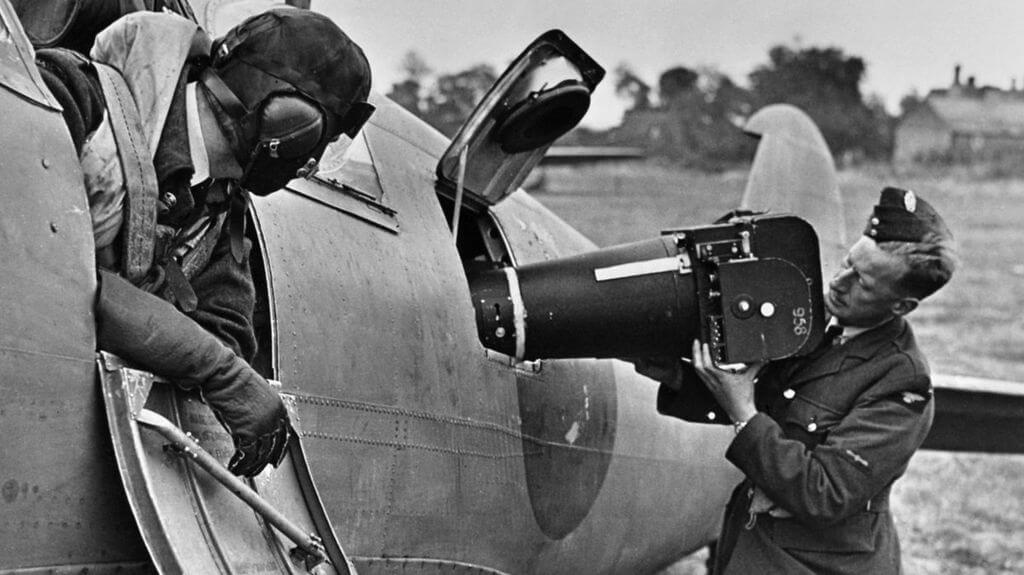 a camera being loaded onto a Spitfire