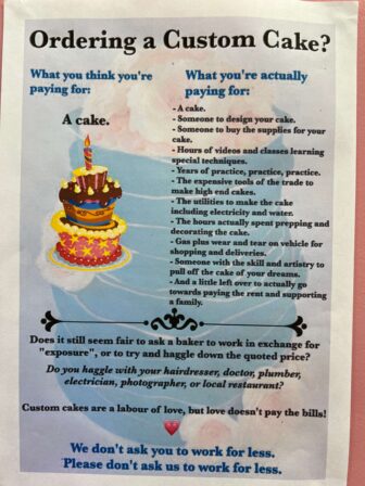 a sign about custom cakes