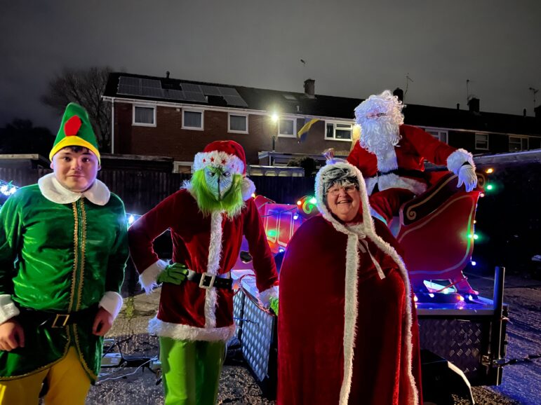 Santa, Mrs Claus and two elves