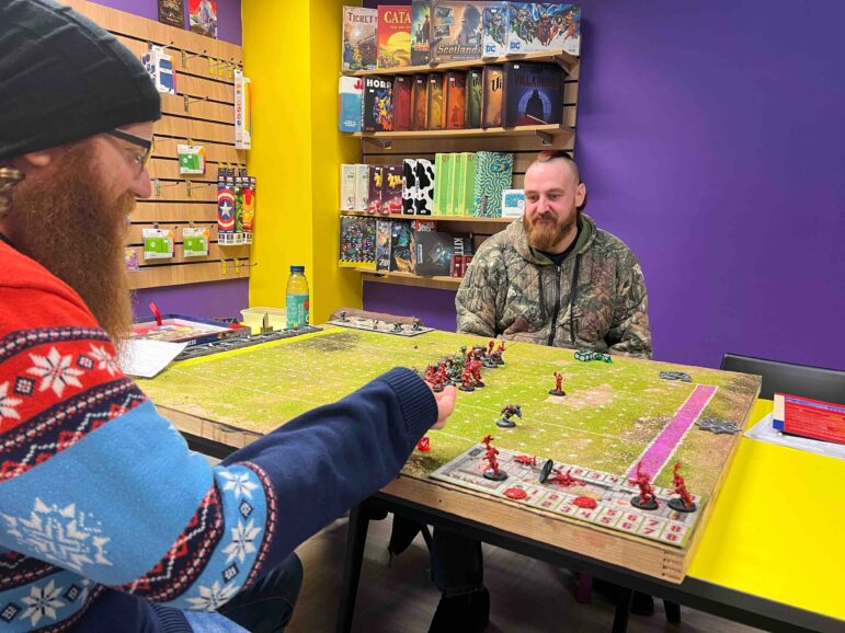 two men play board games