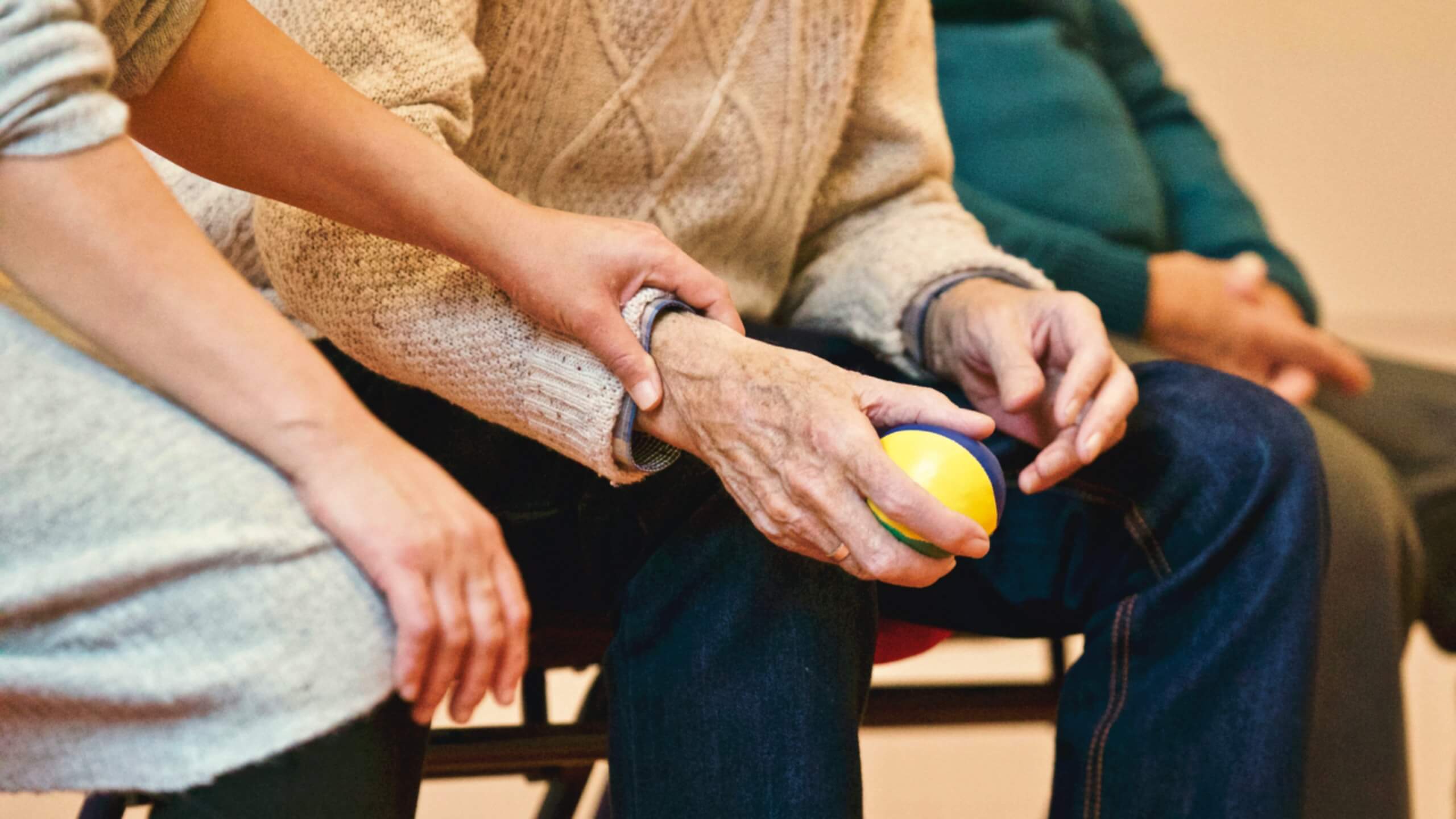 a carer support an elderly person