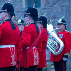 an army band get ready to play